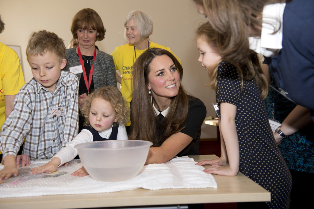 Kate-listened-intently-little-girl-she-visited-offices