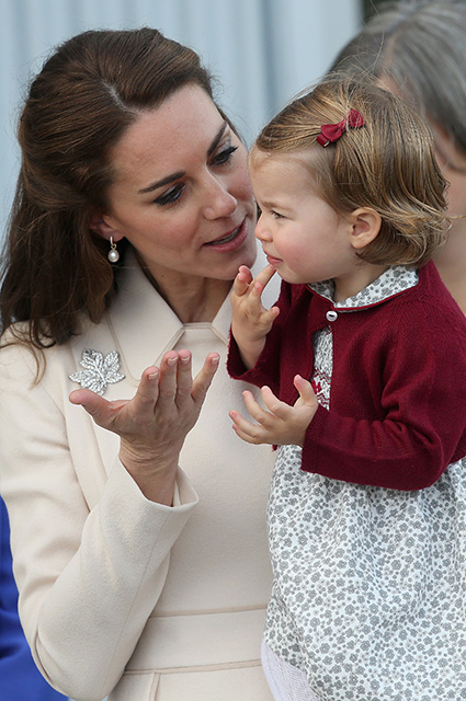 VICTORIA, BC - OCTOBER 01: Catherine, Duchess of Cambridge and Princess Charlotte wave leave from Victoria Harbour to board a sea-plane on the final day of their Royal Tour of Canada on October 1, 2016 in Victoria, Canada. The Royal couple along with their Children Prince George of Cambridge and Princess Charlotte are visiting Canada as part of an eight day visit to the country taking in areas such as Bella Bella, Whitehorse and Kelowna (Photo by Chris Jackson/Getty Images)
