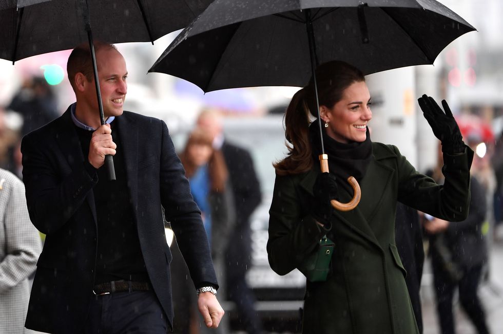Принц Уильям и Кейт Миддлтон под дождем в Блэкпуле